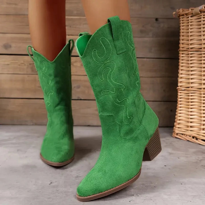 Fashionable women's ankle boots, blending cowboy style with elegant design and detailed western stitching.