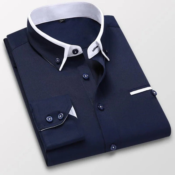 Refined men's button-up shirt featuring a long sleeve design and elegant contrast detailing for a modern style.