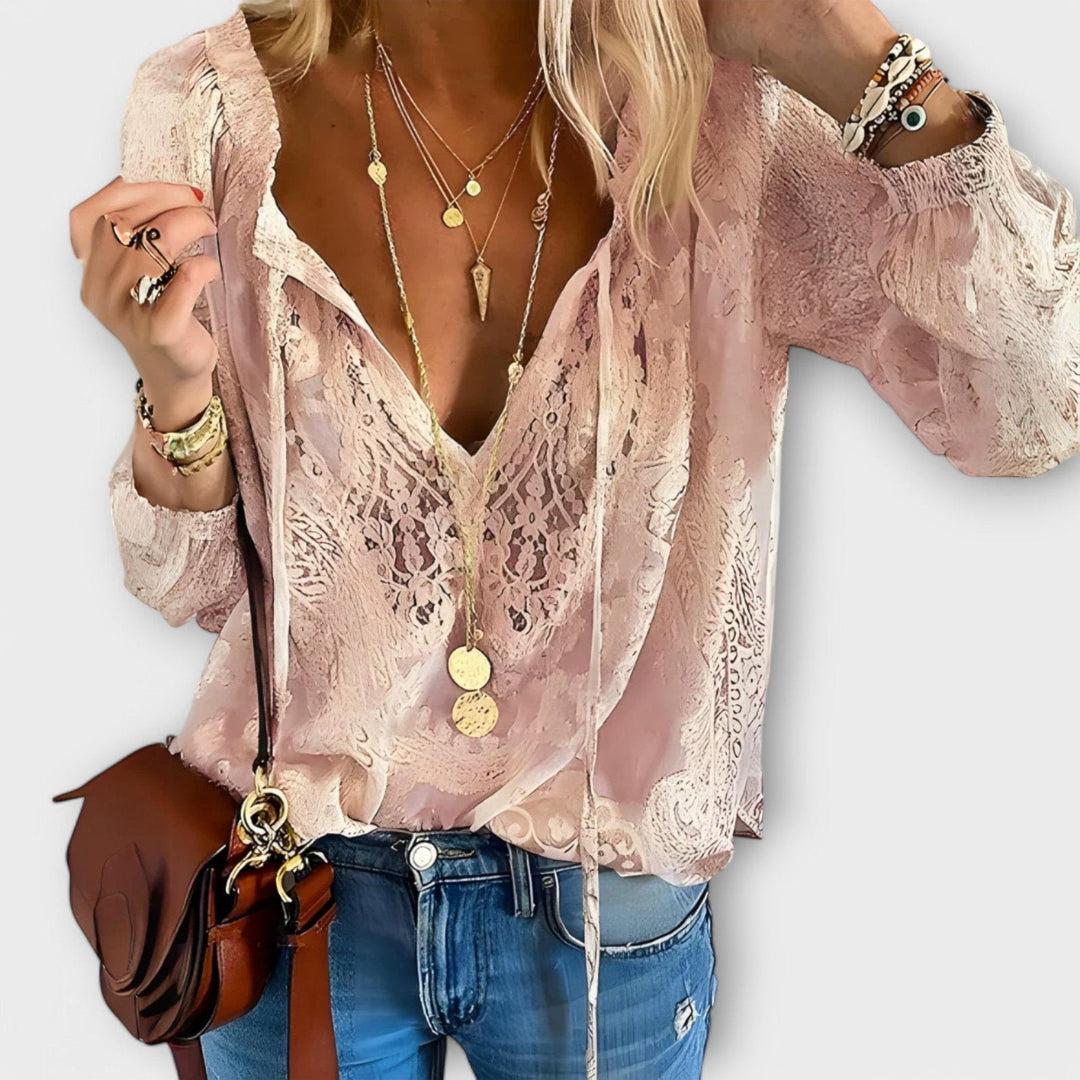Black women's long-sleeve tie-neck blouse, a sophisticated fashion top for elegant office or casual chic.