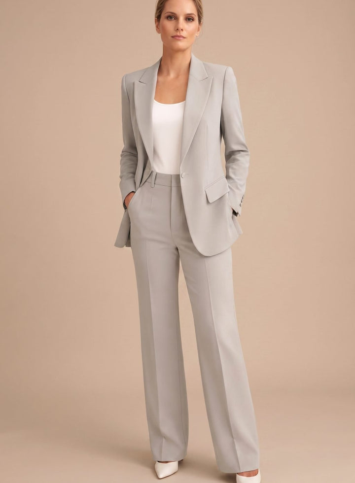 Elegant women's two-piece suit: chic blazer & sophisticated flared trousers for professional office & formal wear.