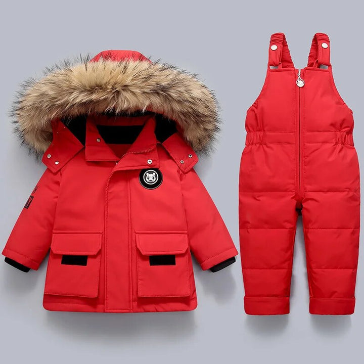 Playful toddler snowsuit set: a colorful winter coat & overall, ideal children's apparel for snowy adventures.