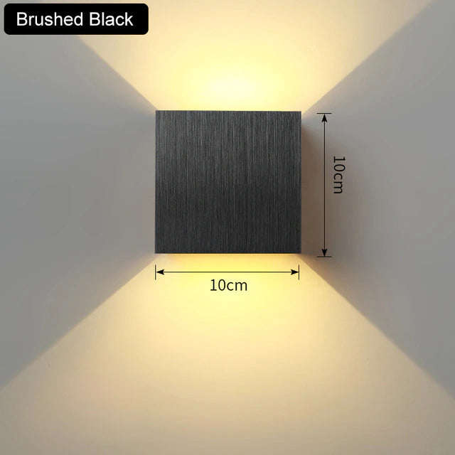 Modern Nvroome Lights LED wall sconce. Up/down accent lighting fixture, energy-efficient for indoor use.