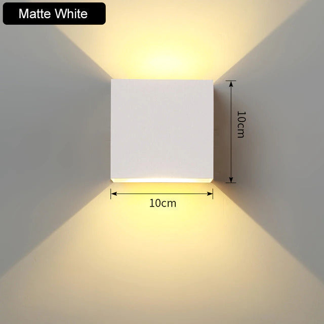 Energy-efficient modern LED wall sconce. Up/down aluminum fixture for indoor accent lighting.