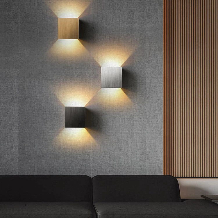 Nvroome Lights modern LED wall sconce. Energy-efficient up/down light adds accent to indoor spaces.