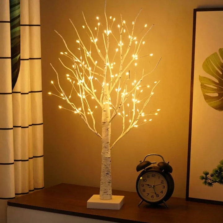 Portable battery-operated LED bonsai tree lamp, a beautiful Nordic birch light for any room's decor.