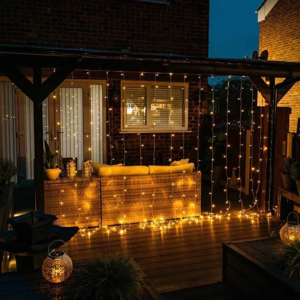 Bright warm white LED curtain string lights, ideal for festive and daily home decor.