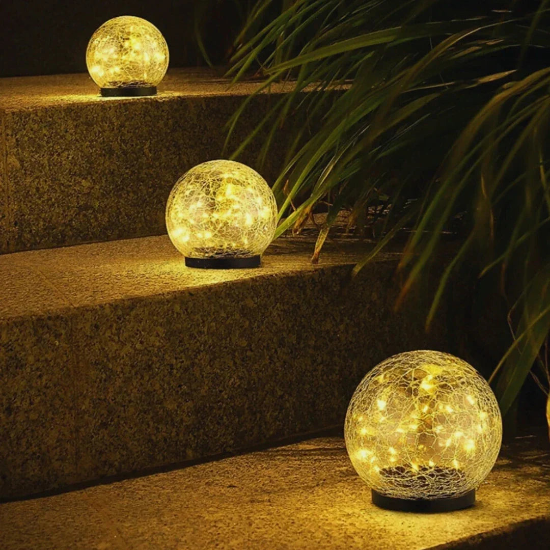 SolarGlobe crackled glass orb garden light, warm white LED, waterproof outdoor decor.