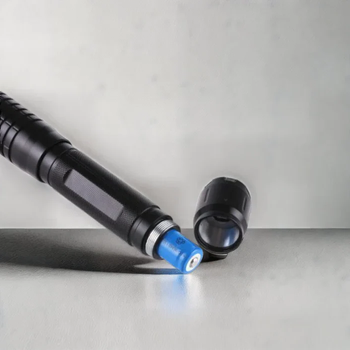 Durable aluminum alloy laser flashlight, rechargeable & high-power. Perfect utility torch for outdoor & survival.