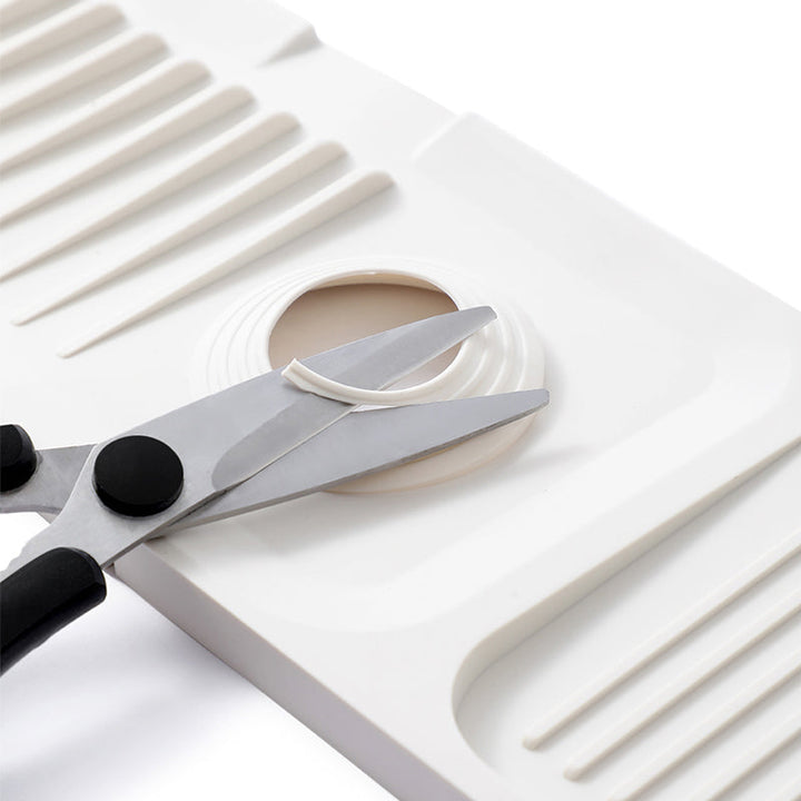 Multi-use silicone draining mat; perfect for kitchen sink, dishes, produce, and countertops.
