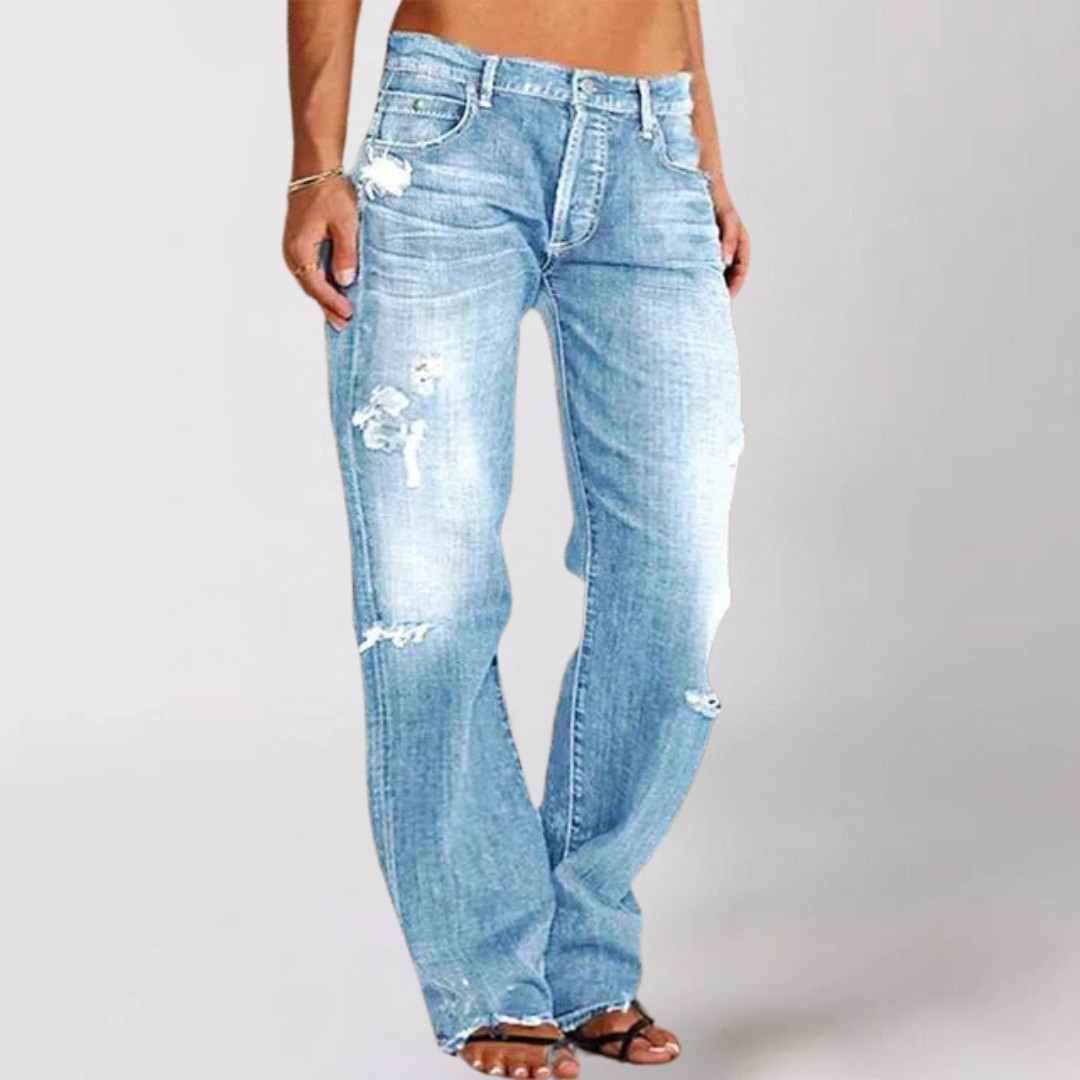 Bohemian-style women's loose wide-leg denim jeans. Comfortable low-rise casual pants for versatile everyday wear.
