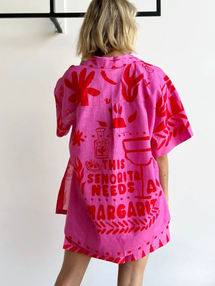 Relaxed fit women's pink short sleeve matching set. Comfortable two-piece summer fashion for casual everyday wear.