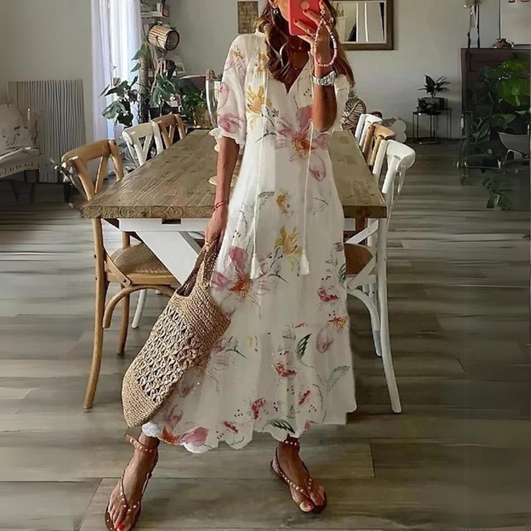 Casual women's floral print summer dress with V-neck & short sleeves. Ideal for comfortable, stylish outings.