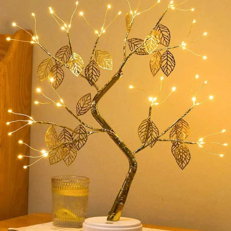 Vibrant LED golden leaf bonsai tree lamp, a warm white decorative light for cozy ambient lighting and home decor.