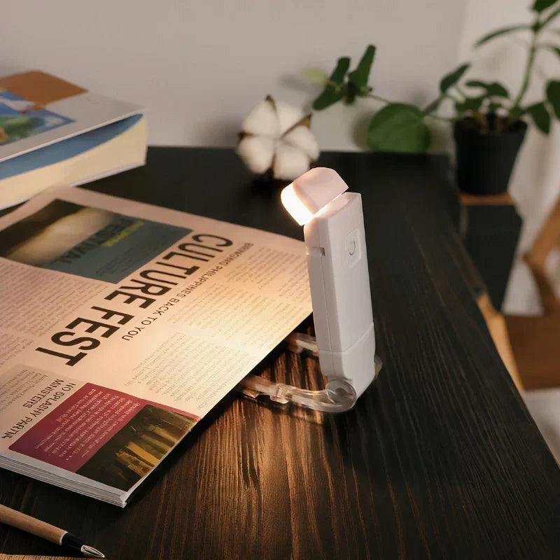 Clip-On LED Reading Light for books, portable, eye-care dimmable, perfect for night reading.