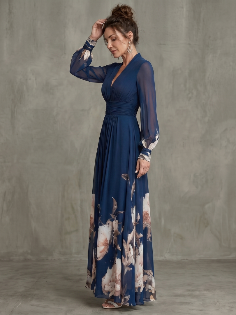 Women's formal navy maxi dress featuring a pleated skirt, sheer sleeves, and a stylish V-neck.