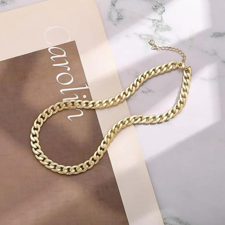 Sleek gold-tone steel minimalist bracelet. Unisex modern fashion jewelry, perfect everyday wear or chic gift idea.