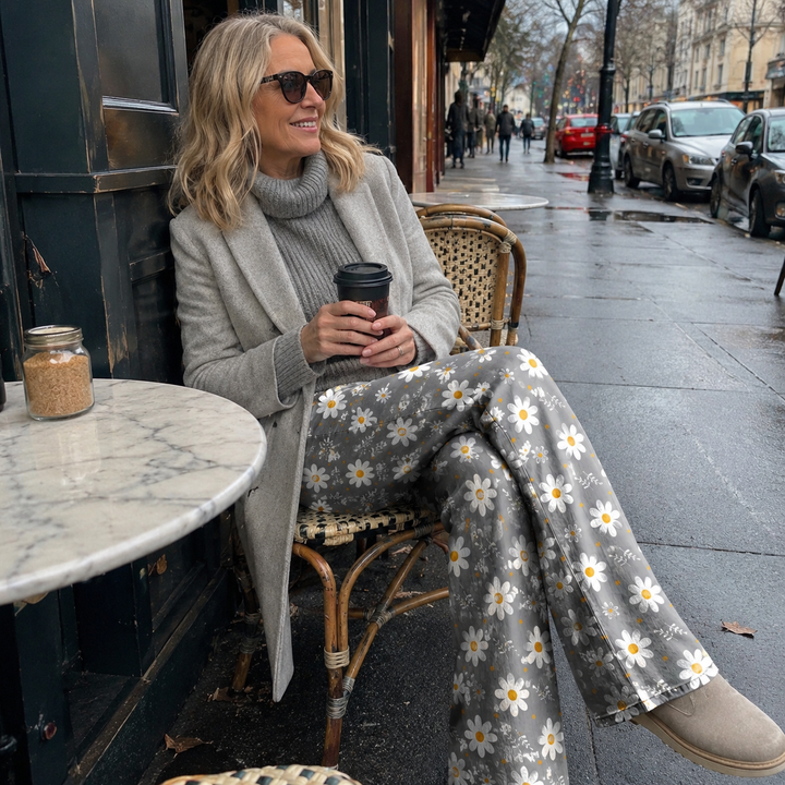 Stylish women's high waist wide leg jeans with unique floral print. Comfortable, fashion-forward patterned trousers.