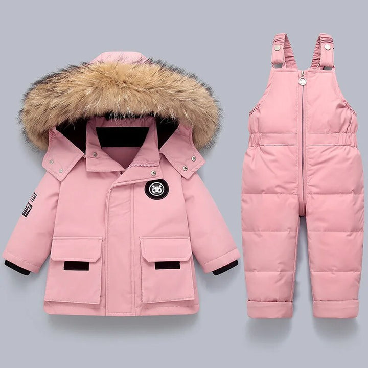 Durable kids' winter snowsuit set designed for outdoor play. Features a waterproof coat & insulated overall for warmth.