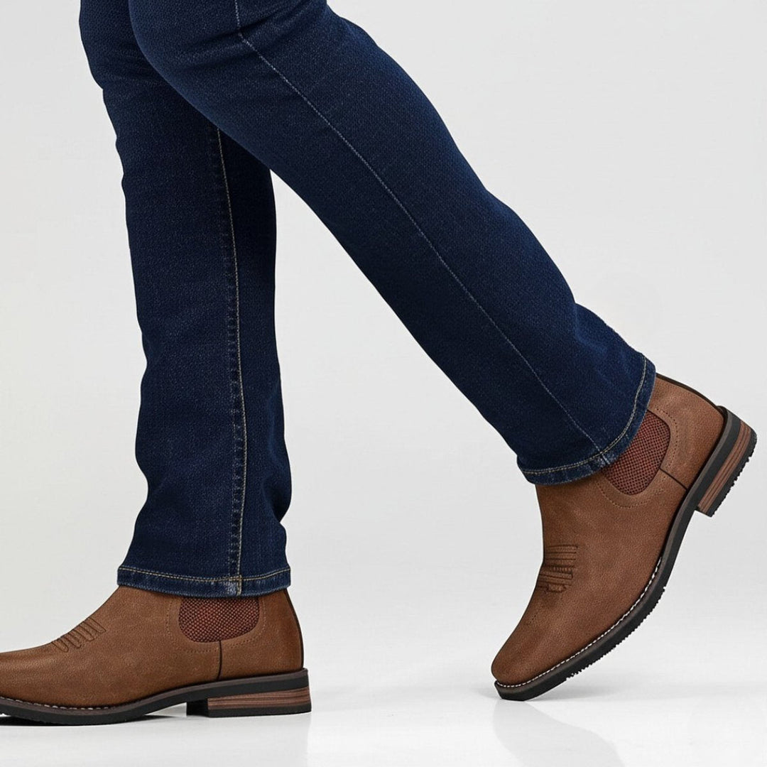 Versatile dark leather men's Chelsea boots. Easy slip-on style, perfect for casual or dressy occasions.