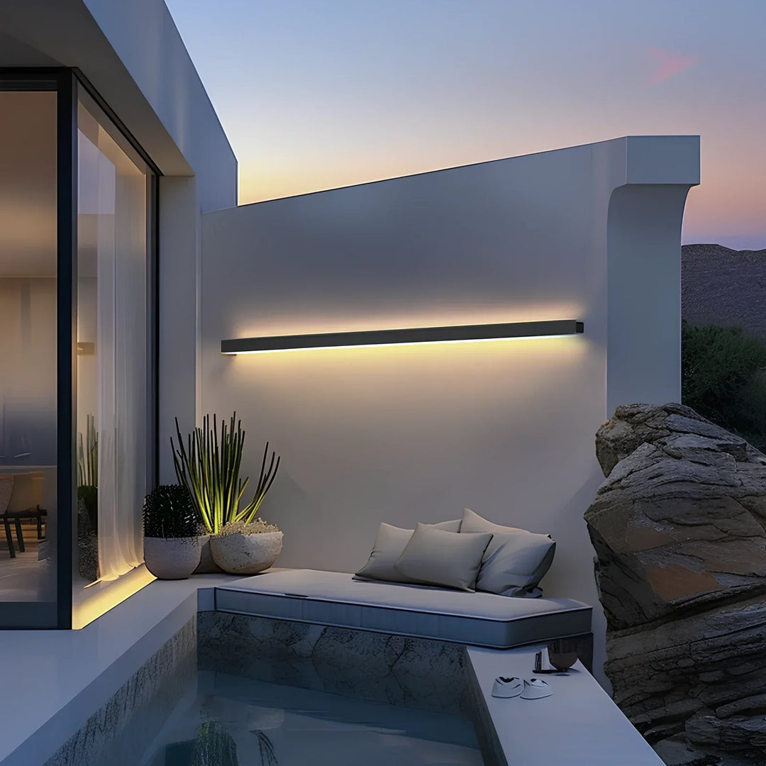 Energy-efficient modern LED wall sconce, weatherproof for bright outdoor facade and exterior lighting.