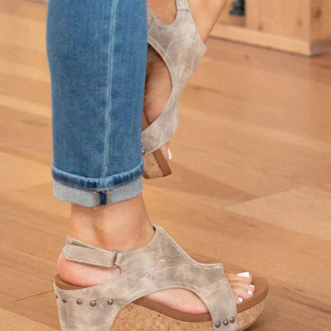 Comfortable open-toe wedge sandals for women. Slip-on design, ideal summer shoes for casual & chic style.