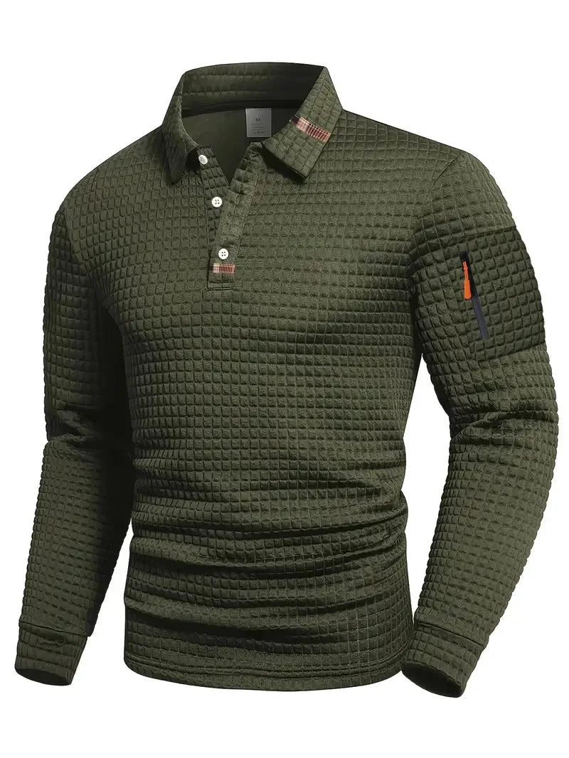 View of a men's elegant long-sleeve polo shirt, showcasing its subtle texture and sleeve pocket detail.