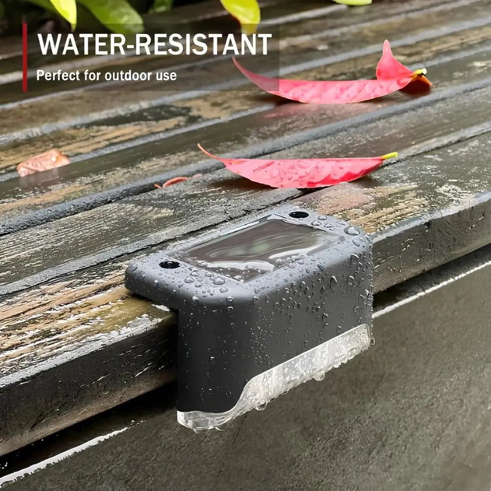 Solar LED step lights with warm glow for outdoor pathways & safety.