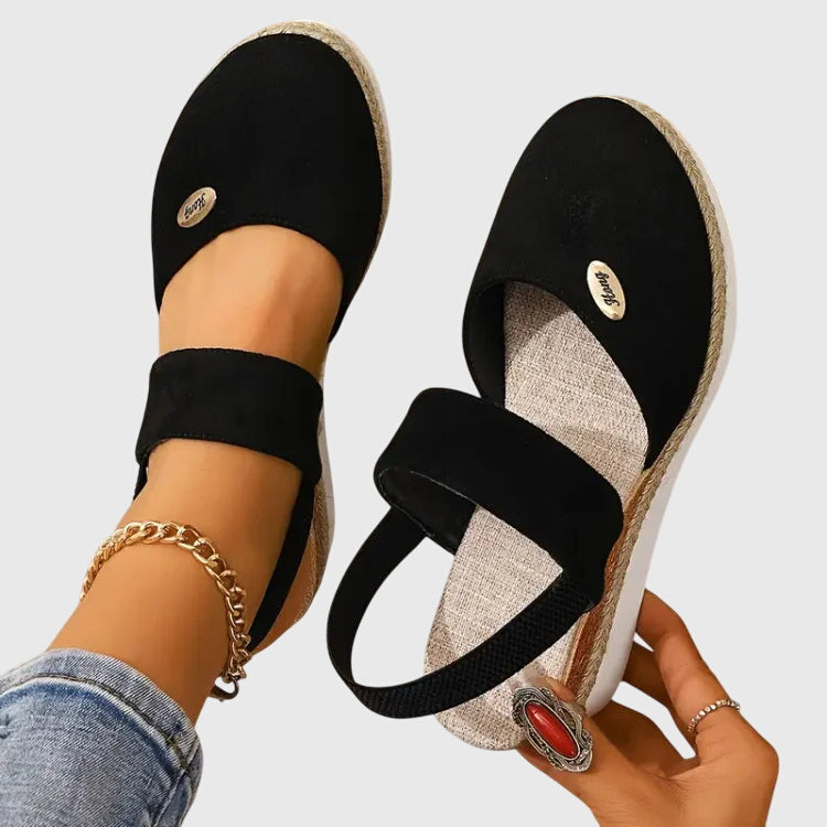 Chic women's orthopedic sandals, blending style with essential arch support & cushioned comfort.