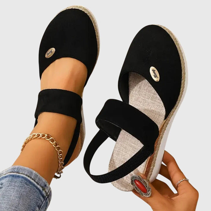 Chic women's orthopedic sandals, blending style with essential arch support & cushioned comfort.
