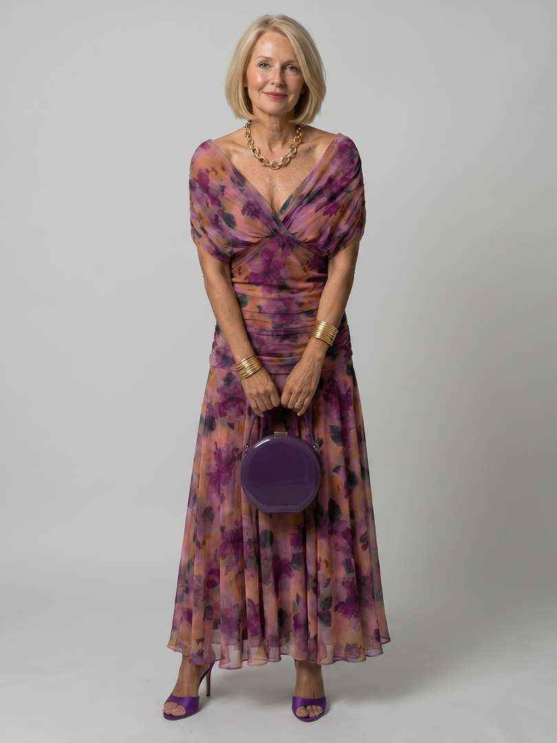 Women's elegant off-shoulder midi dress with a flowy skirt, perfect for summer comfort.