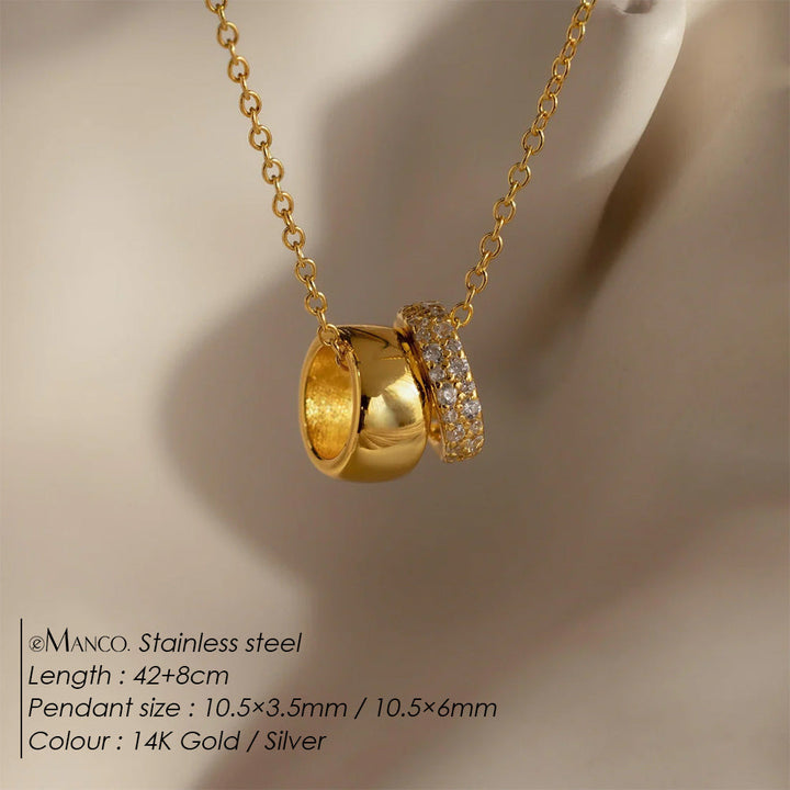 Versatile women's duo ring necklace with a minimalist double circle pendant. A chic and elegant fashion accessory.