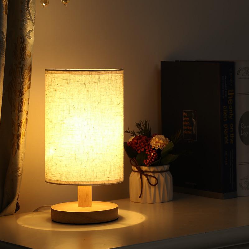 Nvroome Organic Glow: Wood table lamp with dimmable LED. Ideal bedroom or living room lighting.