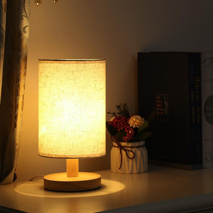 Nvroome Organic Glow: Wood table lamp with dimmable LED. Ideal bedroom or living room lighting.
