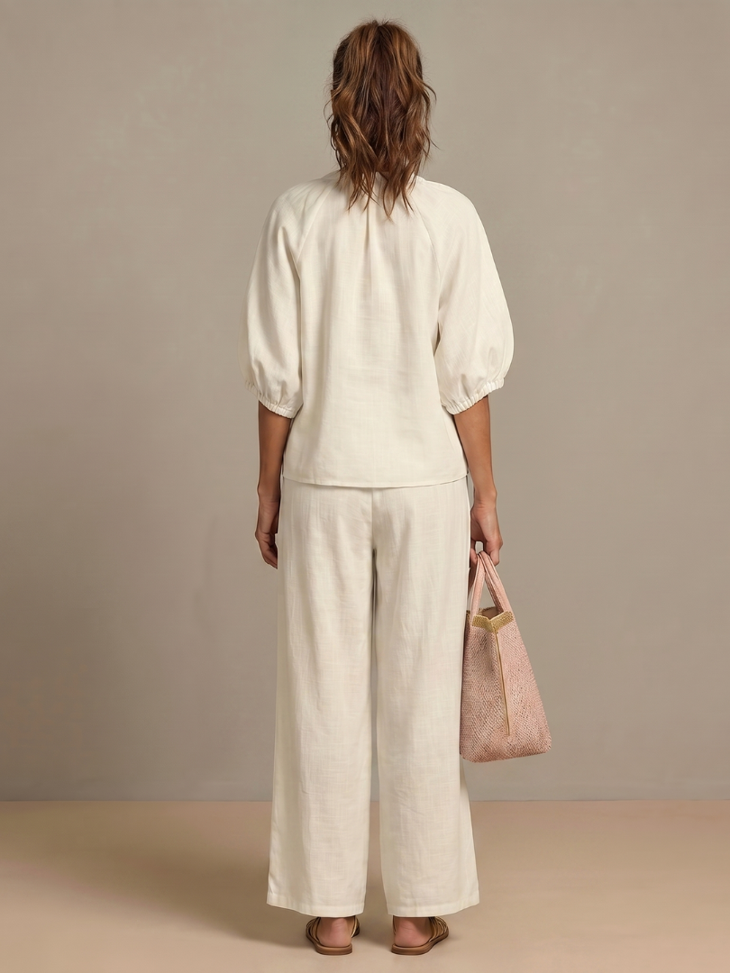 Relaxed fit women's two-piece outfit for comfortable, everyday elegant wear.