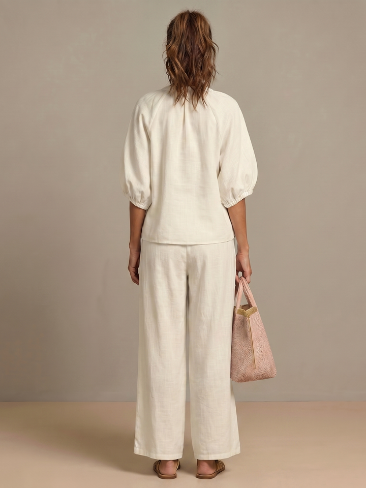 Relaxed fit women's two-piece outfit for comfortable, everyday elegant wear.
