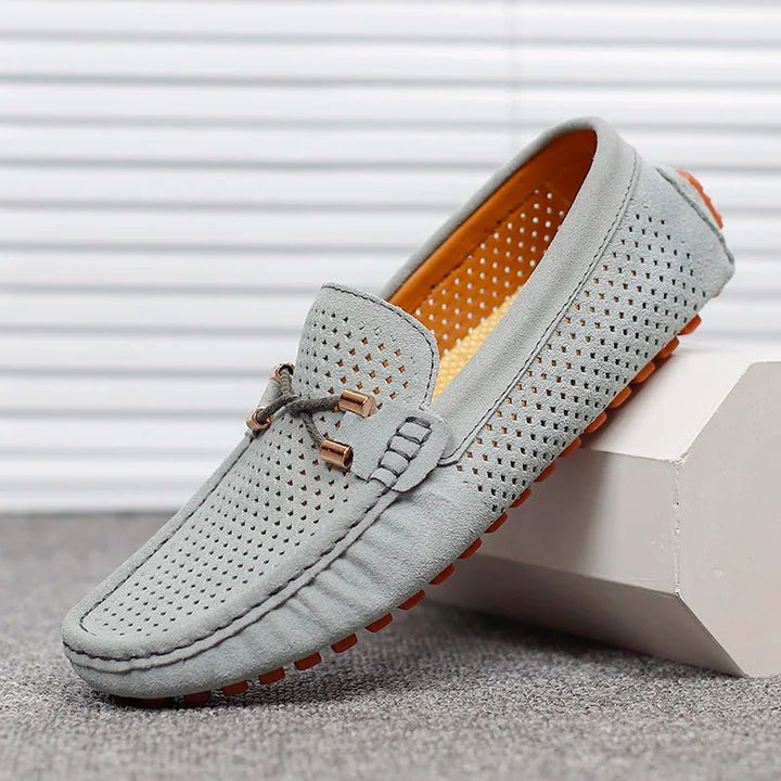 Lightweight men's comfort loafers for everyday and formal wear, featuring breathable design.