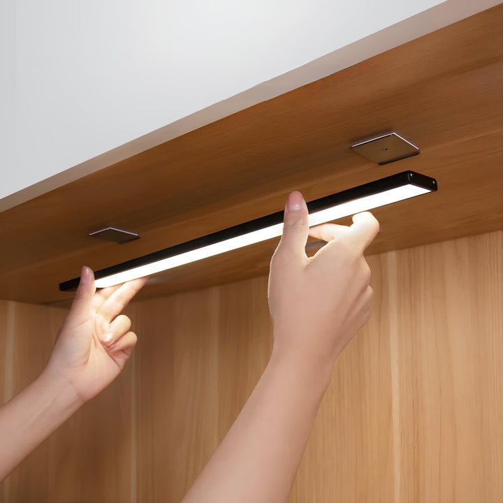 Versatile wireless LED light bar, motion sensing & USB rechargeable, for cabinets, closets, and utility.