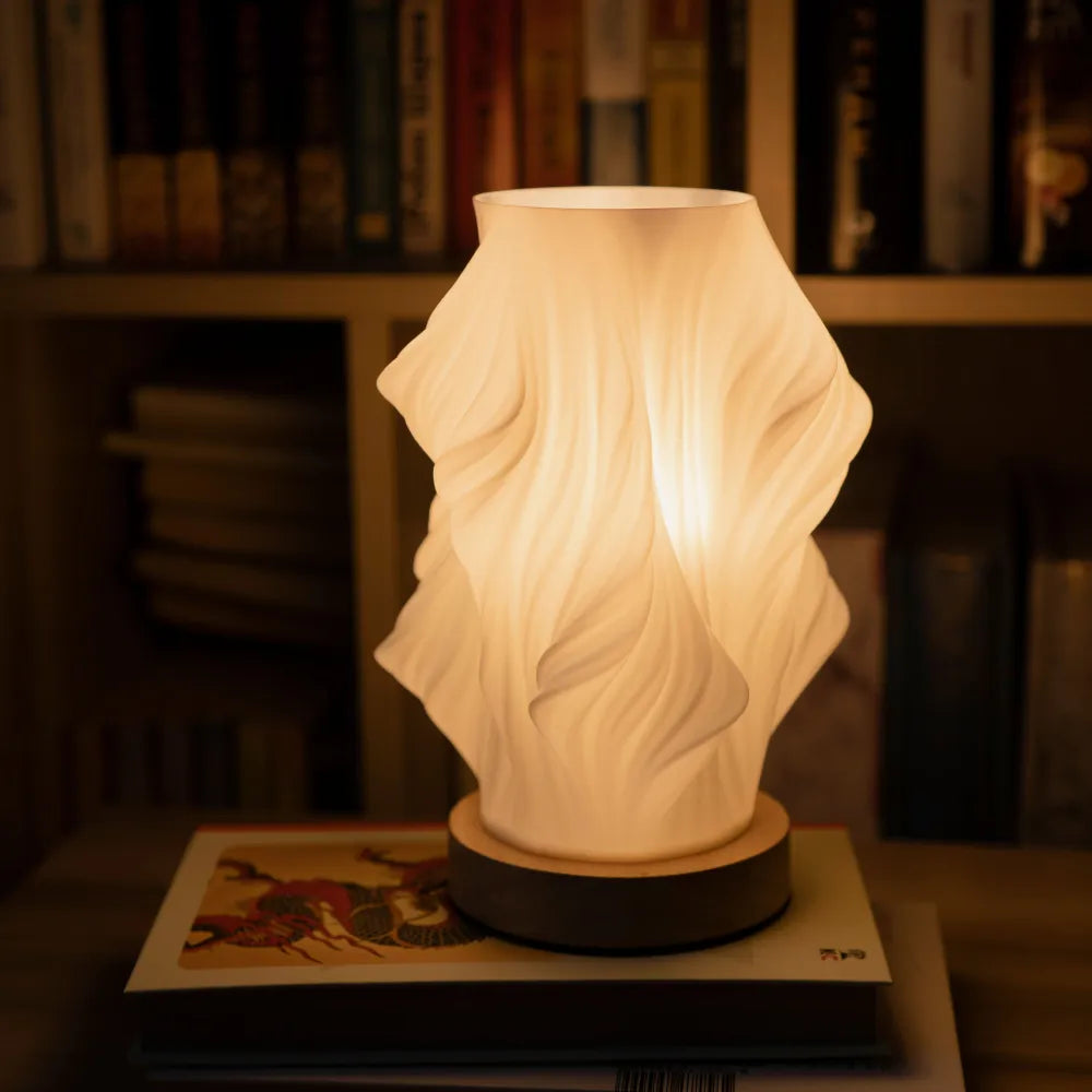 Dimmable Wavecrest lamp, natural light, adds a modern touch to your desk or bedside.