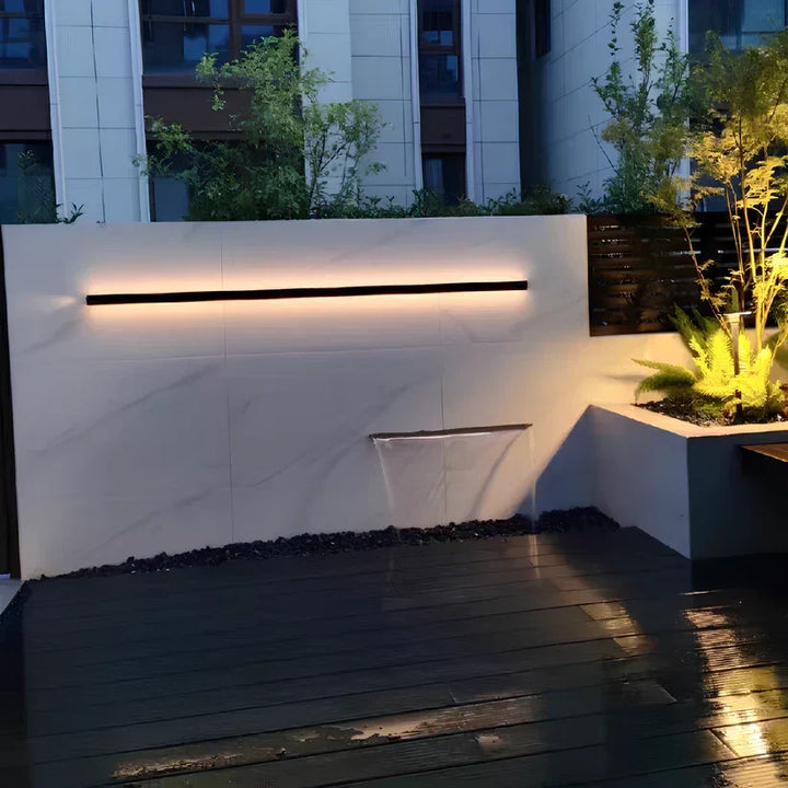 Contemporary outdoor LED facade light, linear design, adds a modern home accent and decor.