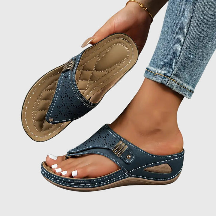 Navy slip-on wedge sandals for women, featuring orthopedic arch support, perfect for casual summer wear.