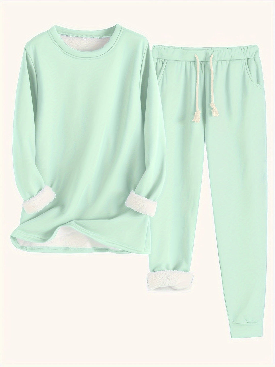 Women's comfortable two-piece lounge set with a long-sleeve top and relaxed fit pants.