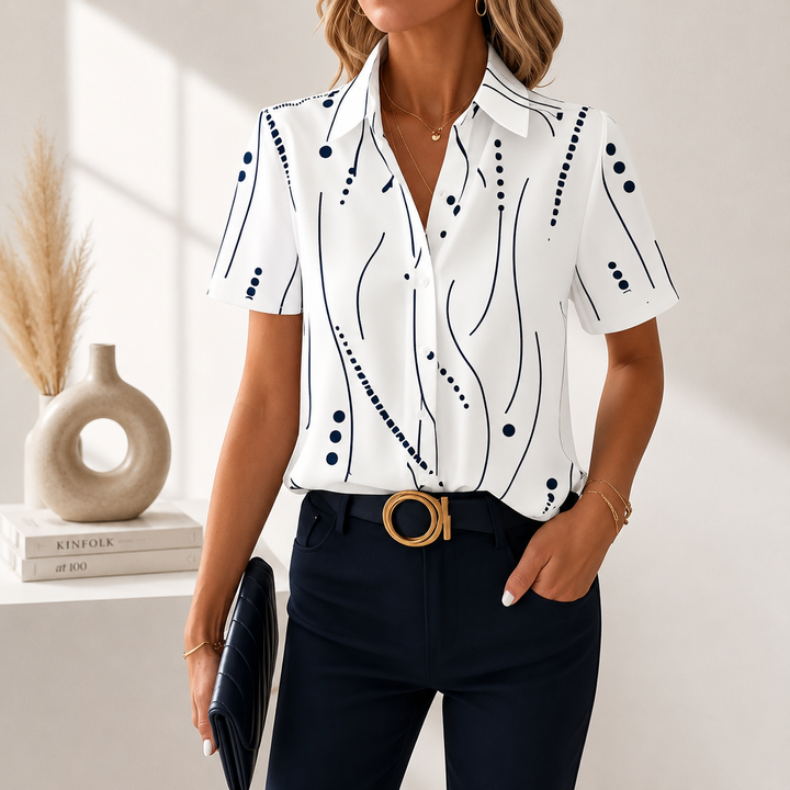 Stylish women's abstract print blouse, short sleeve, paired for a versatile workwear or casual elegant outfit.