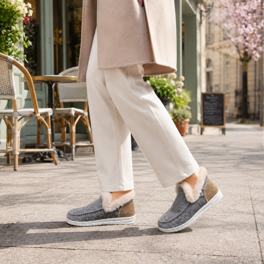 Stylish women's orthopedic comfort slippers with a non-slip sole for indoor use.