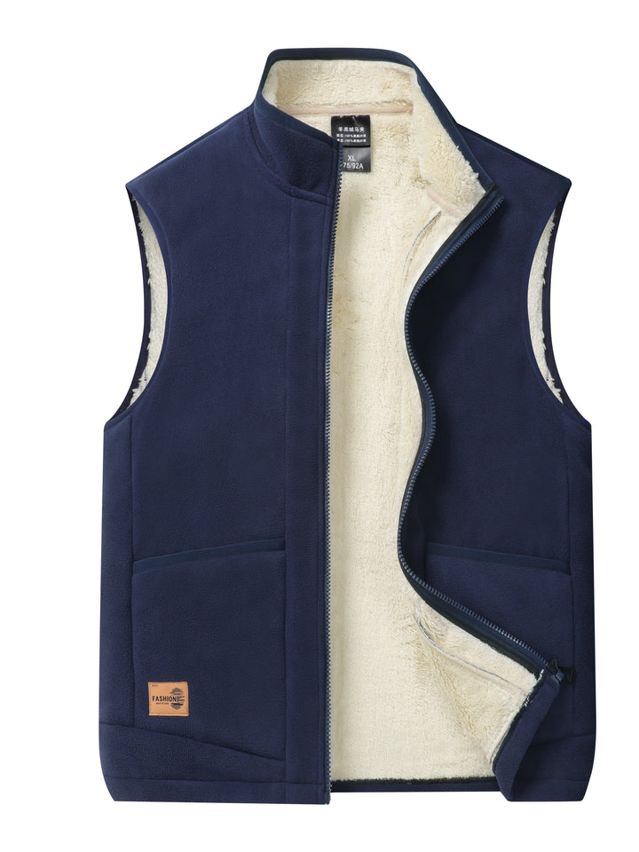 Warm men's puffer vest, fleece-lined for comfort. Excellent layering piece, a stylish winter sleeveless jacket.