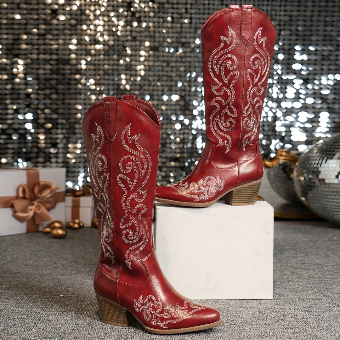 Women's stylish knee high western boots, featuring elaborate embroidery and a comfortable block heel.