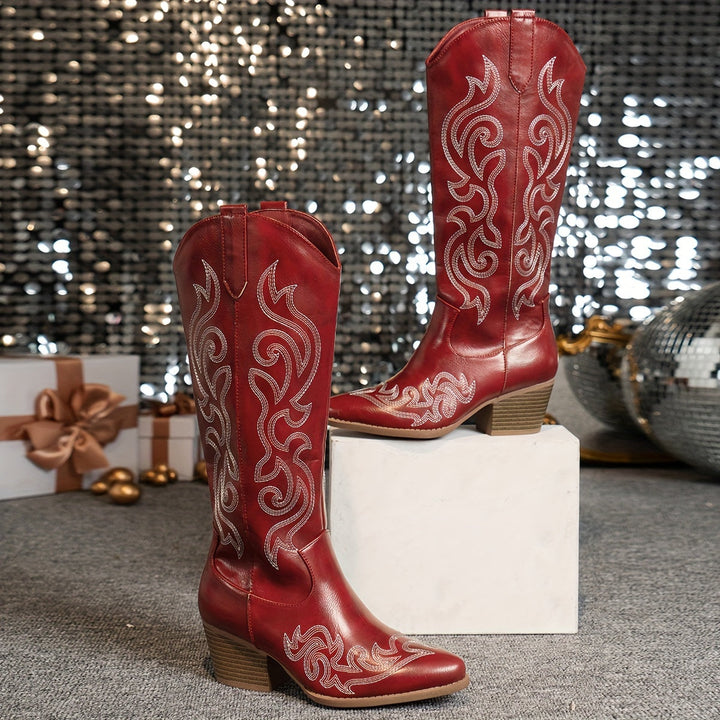 Women's stylish knee high western boots, featuring elaborate embroidery and a comfortable block heel.