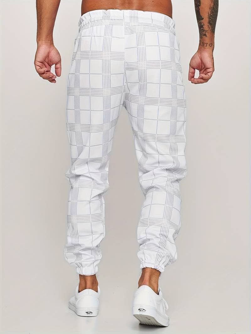 Comfortable & stylish men's checked jogger pants. Modern design, perfect for travel and daily comfort.