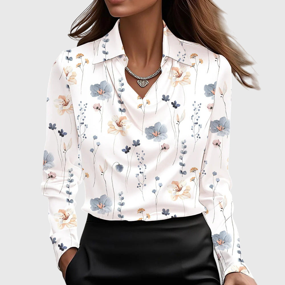 Elegant women's fashion blouse with a flattering pleated neckline and flowing, comfortable fit.