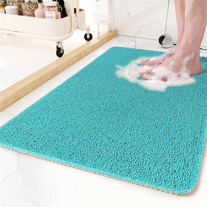 Quick-dry hollow drainage mat, perfect for wet areas like bathrooms & showers, ensures anti-slip security.