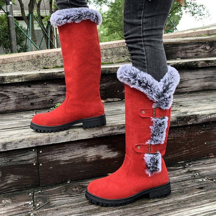 Cozy women's tall boots with faux fur trim & stylish buckles, ideal for fall/winter outfits.